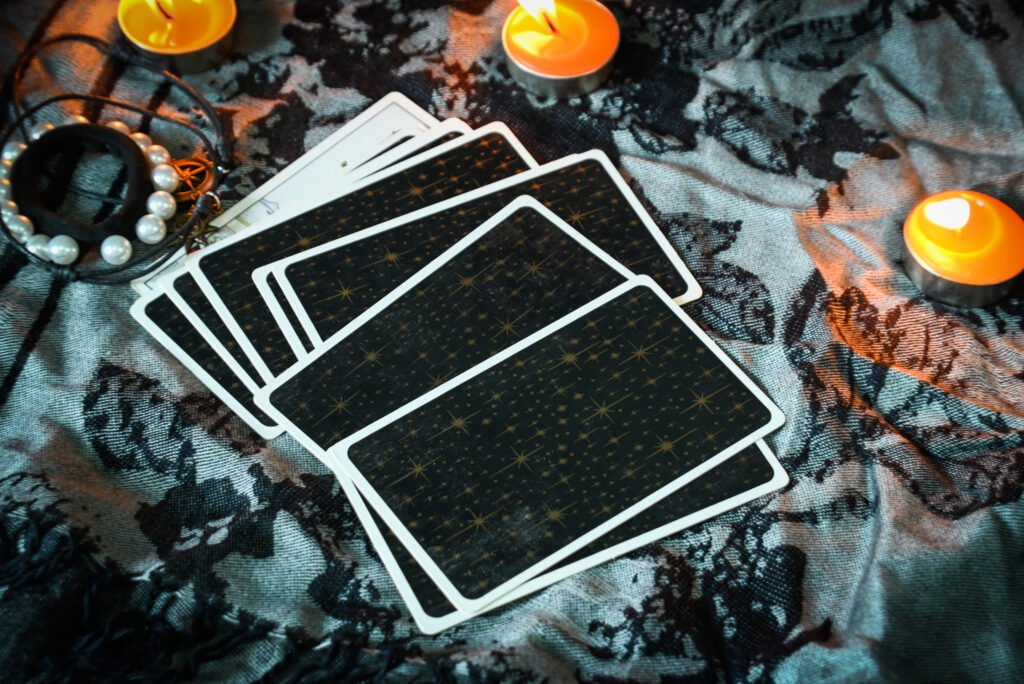 tarot reading with tarot card background and candlelight on the